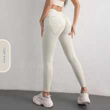 Leggings de talle alto con bolsillos